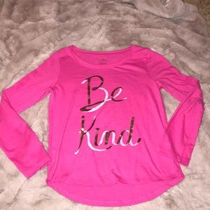A pink long sleeve shirt